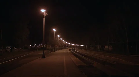 Night time bikepath dimly lit Video stock 46204587