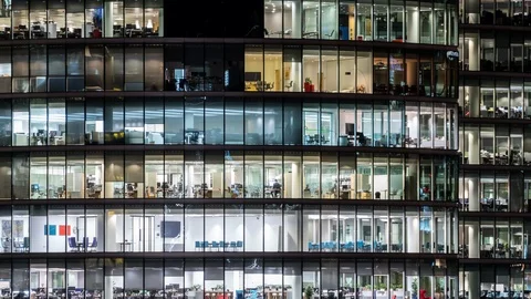 Night time Close up View Office Windows Skyscraper London City UK Time lapse Stock Footage 107979402