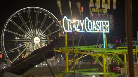Night time crazy coaster ride Stock Footage 255384618