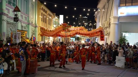 A night-time dragon dance captured in slow motion Stock-Footage 318262371