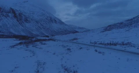Night-time driving with no light on snowy icy winter road Stock Footage 149943057