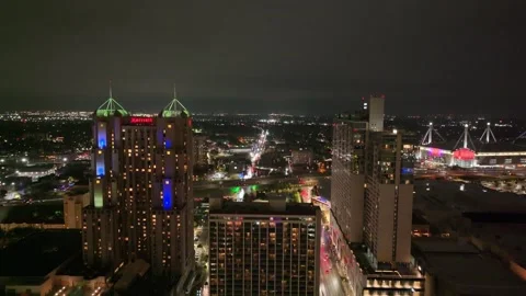 Night time Drone flight Downtown San Antonio above RiverWalk Stock Footage 255693756