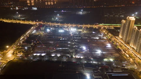 Night time drone timeplapse of Wuhan Covid19 hospital construction, China Stock Footage 130884637