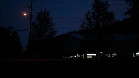 A night time establishing shot of a sporting complex building Stock Footage 96048485