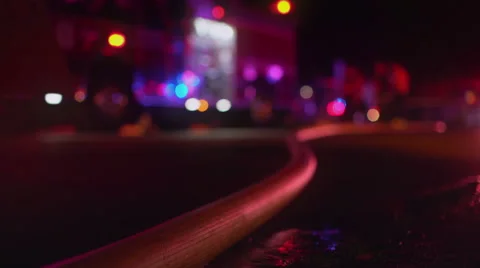 Night time fire scene with hose Stock Footage 66793848