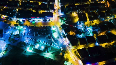 Night Time Hyperlapse In A Busy City. Bridge and road. Aerial Drone Shots. Vídeo Stock 141393233