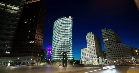 Night time hyperlapse of Deutsche Bahn tower at Potsdamer Platz Berlin, Germany Stock Footage 135906649