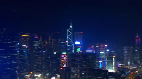 Night time illuminated hong kong bay rooftop downtown panorama 4k china Stock Footage
