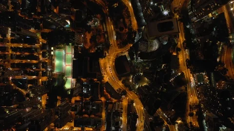 Night time illuminated hong kong city traffic streets aerial topdown panorama 4k Stock Footage 104911859