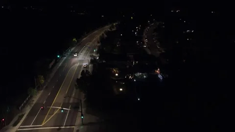 Night time intersection aerial flyover with light traffic Stock Footage 218531878