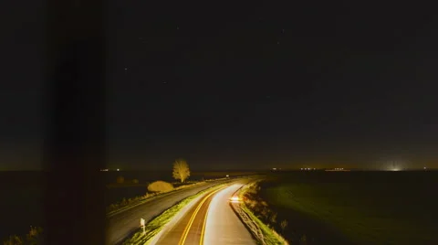 Night time lapse on the bridge over the road with a view of the stars. Relax Stock Footage 62520761