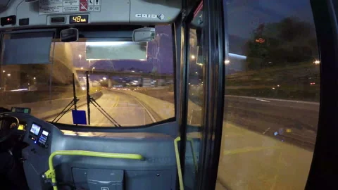Night time lapse of Bus driver Stock Footage 95552380