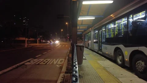 Night time lapse of bus stop on  bus rapid transit corridor, Stock Footage 147642407