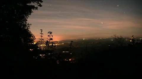 Night Time-Lapse Descend into a Valley – City Lights &amp; Traffic 4K Stock-Footage 320835993