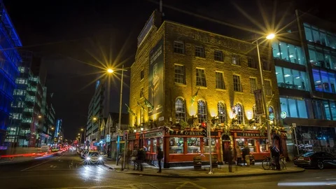 Night time lapse at the Ferryman Pub, Dublin City centre, Ireland Stock Footage