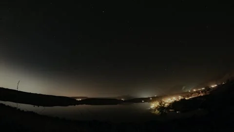 Night time lapse on the lake shore. Sunset and sunrise in timelapse. Stock Footage 311161616