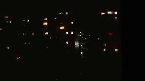 Night time lapse of Light in the windows of a multistory building. life in city Stock Footage 107414254
