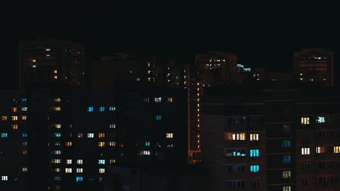 Night time lapse of Light in the windows. night at home, turning off and turning Stock Footage 125511672