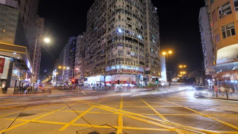Night time-lapse of Nathan and Jordan roads intersection, Hong Kong Video stock 309440110