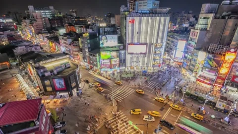 Night Time-lapse People crowd and traffic in Ximending shopping district, Taipei Video stock 152497067
