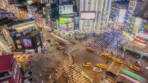 Night Time-lapse People crowd and traffic in Ximending shopping district, Taipei Stock-Footage 152497215