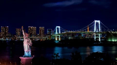 Night Time lapse of Rainbow bridge in Odaiba, Japan Stock Footage 106868010