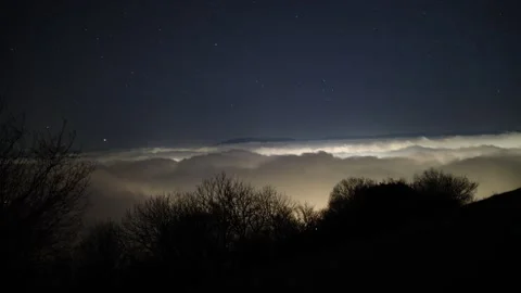 Night time lapse of rolling clouds Stock Footage 263257537