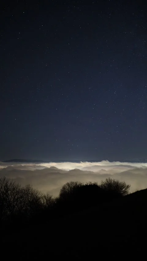 Night time lapse of rolling clouds captured from above Stock Footage 263376985