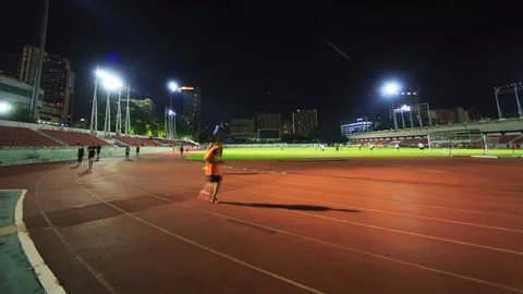Night Time-lapse :  Runner's Feet, Motion Blurred @ BANGKOK, THAILAND Stock Footage