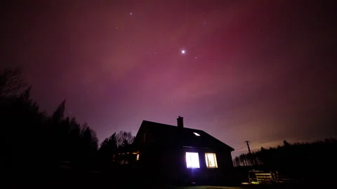 Night time lapse with SAR arc over house. Aurora borealis timelapse. Stock Footage 297787144