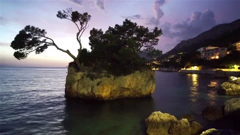 Night Time lapse of Stone Landscape in the Adriatic Sea in Brela, Croatia Stock Footage 113520755