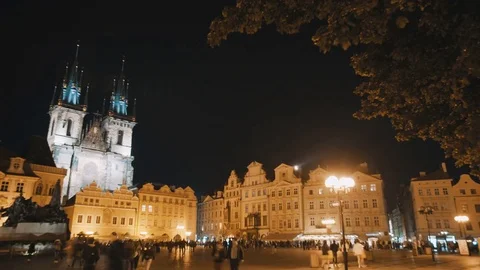 Night time lapse of tourists at the central square of Prague Stock Footage 76533963
