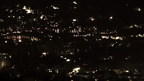 Night. time-lapse of town looking across valley Видео 130097199