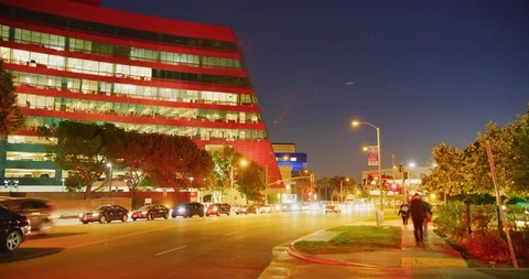 Night time-lapse of traffic during rush hour at Pacific Design Center in West Stock Footage 115090520
