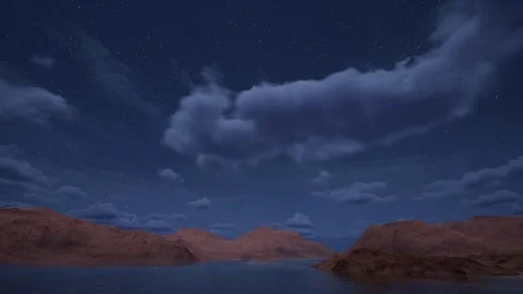 Night time lapse of a twinkling starry sky with clouds over a mountain lake. Stock Footage 253965588