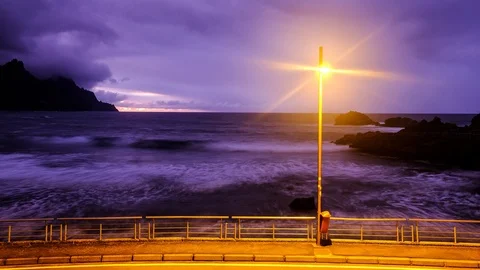 Night time lapse video of seafront lantern and Atlantic ocean, Benijo beach o Stock Footage 120792088