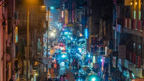 Night Time Lapse View of Main Bazaar Street in Central Delhi, India Stock Footage