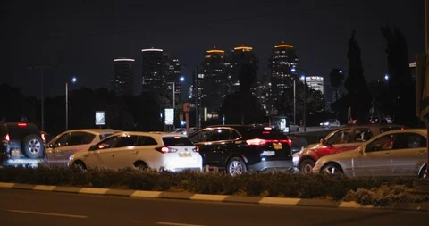 Night time lapse view of traffic on a busy city road, medium. Seamless looping Stock Footage 120232360