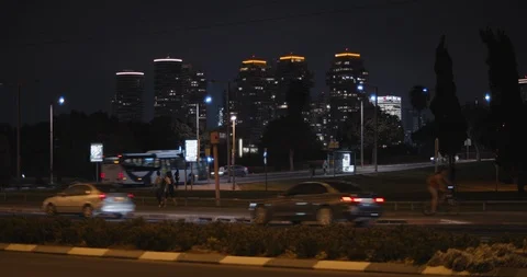 Night time lapse view of traffic on a busy city road, medium. Stock Footage 120233365