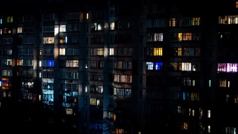 Night Time-lapse in the Windows of a Multi-story Building Stock Footage 260505240