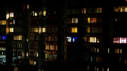 Night Time-lapse in the Windows of a Multi-story Building Stock Footage 260801276