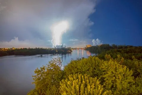 Night time long exposure of multiple lightning bolt strike from passing storm Stock Photos