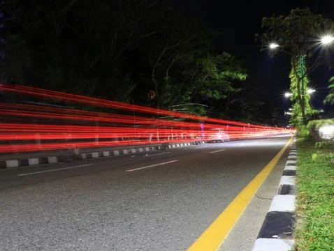 A night time , long exposure view light trails in the street Stock Photos