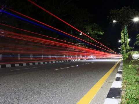 A night time , long exposure view light trails in the street Stock Photos