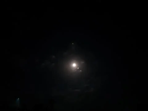 At night time moon, cloud sky in the village of West Bengal, India. Stock Photos