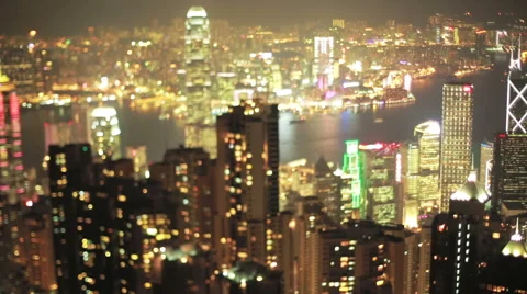 Night-time pan across Hong Kong from Victoria Peak with a tilt-shift lens Stock Footage 57105892