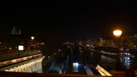 Night time paris double-decker bus ride traffic river bridge panorama 4k france Stock Footage
