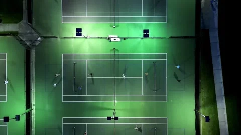 Night time pickleball courts with high pull back movement from tennis court Vídeos de archivo 280145159