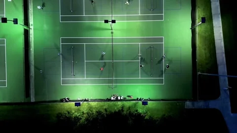 Night time pickleball courts with high slow pulling forward movement Vídeos de archivo 280145183