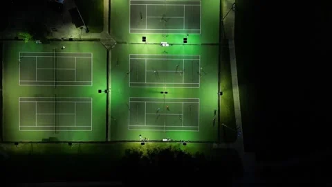 Night time pickleball courts with high drop downward movement Vídeos de archivo 280145233
